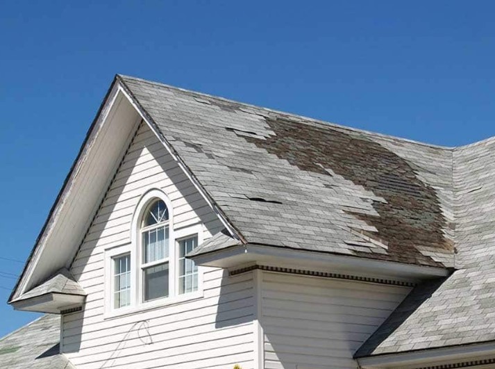 post-storm roof inspection in Le Claire, IA